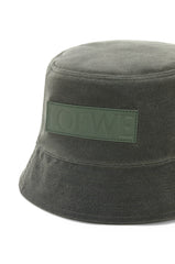Bucket hat in waxed canvas and calfskin