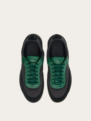 Sneaker with patent leather trim