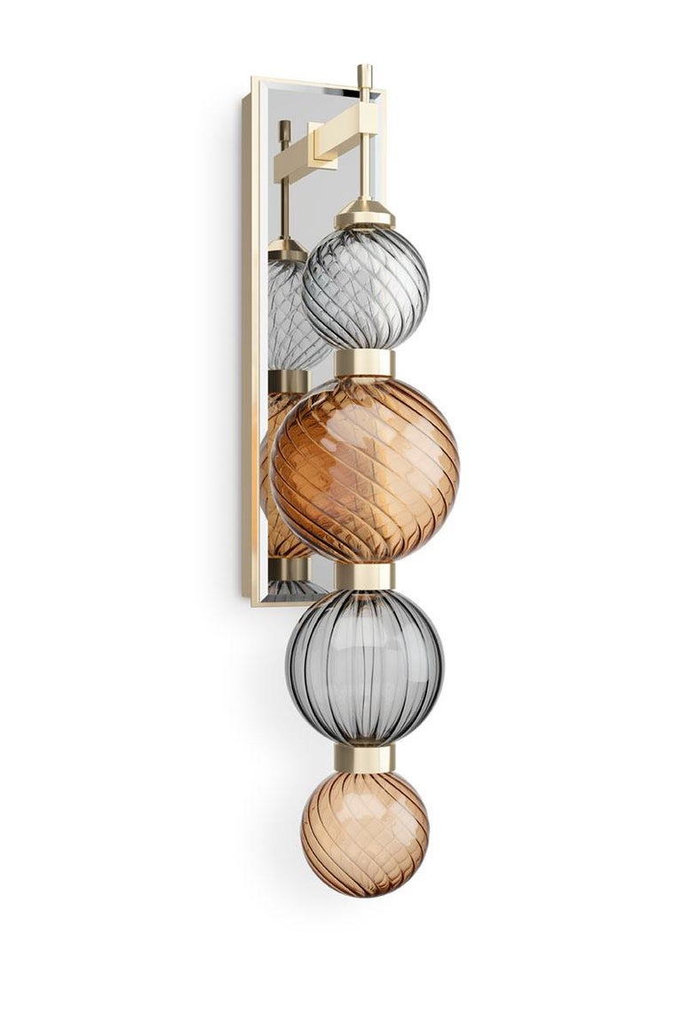 Wall Sconce made coloured glass spheres and satin champagne metal finish