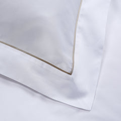 Heirlooms luxuriously soft Savoy bedroom duvet & Oxford Pillowcase set with 600 thread count cotton sateen combined with an elegant satin sand colour piping
