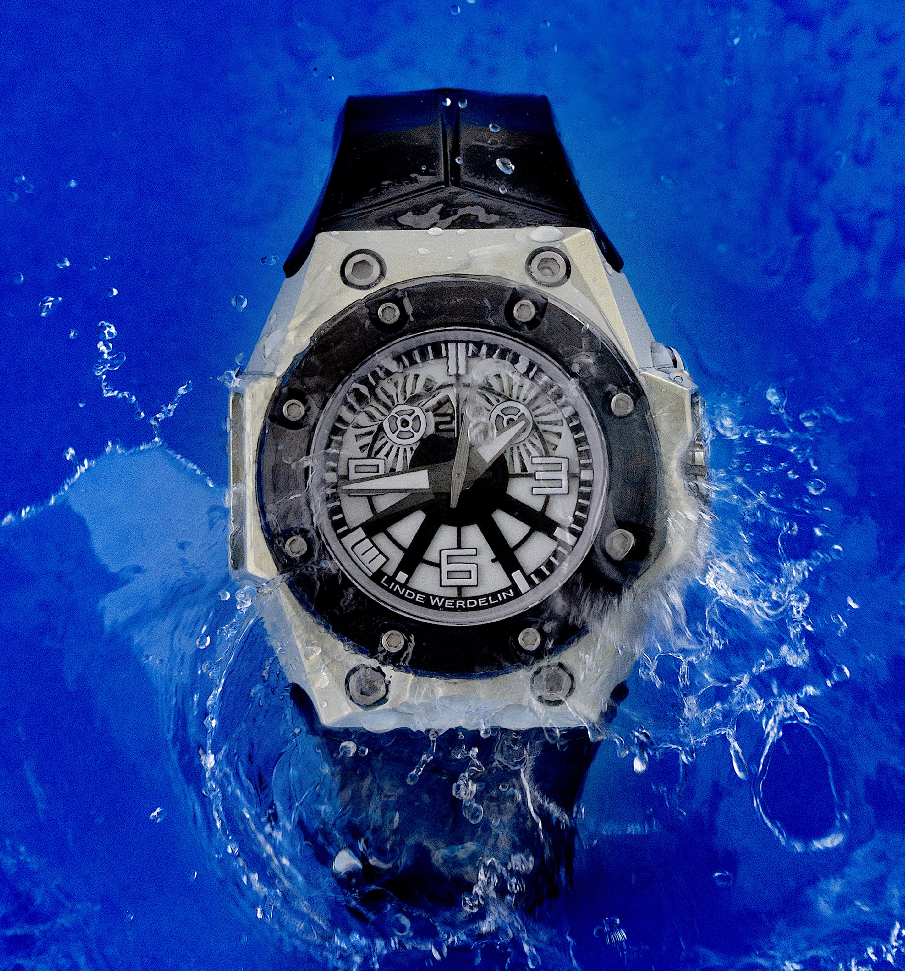 Oktopus Blue Sea is clean and monochromatic, with a subtle dial and clean facets on the milky white Alloy Linde Werdelin (ALW) case