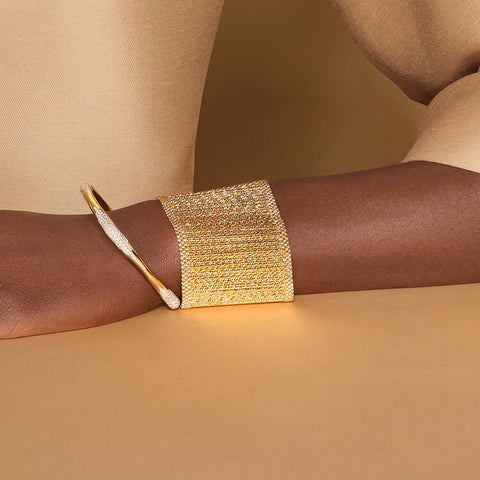 Cuff bracelet made of etheral and moving gold bars Crafted  18K yellow gold Makeda Collection